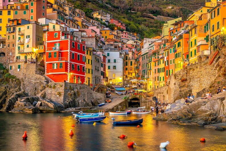 https://guideupstudyabroad.com/wp-content/uploads/2025/05/freepicdownloader.com-riomaggiore-colorful-cityscape-mountains-mediterranean-sea-cinque-terre-italy-europe-medium.jpg